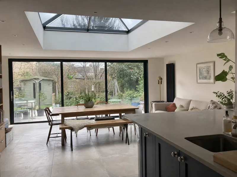 Finished kitchen extension with roof lantern and sliding doors in a Dublin house