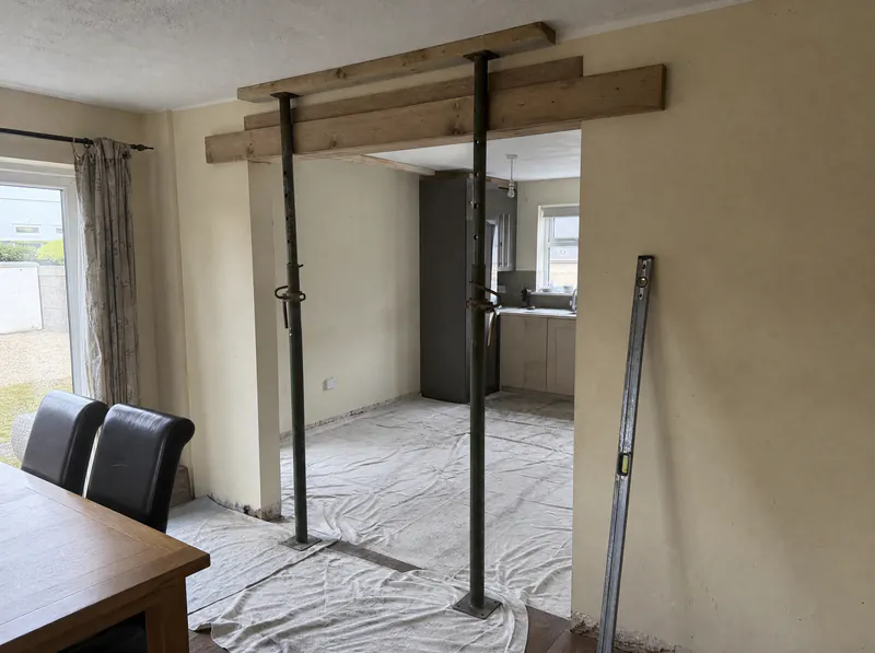 Props and needles installed before a load-bearing wall is cut out in a Dublin kitchen